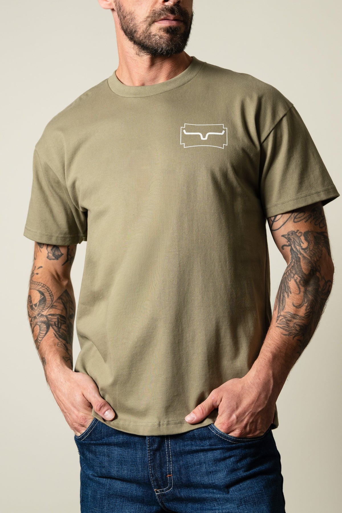 Kimes Ranch Camo Crest shirt in Light Olive, short sleeve crew neck tee with a white Kimes Ranch logo on the left chest; #color_light olive