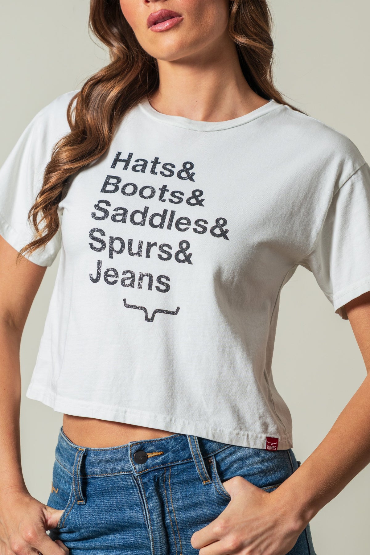 Kimes Ranch Hats & Boots short sleeve natural graphic tee with stacked text reading Hats & Boots & Saddles & Spurs & Jeans; #color_natural