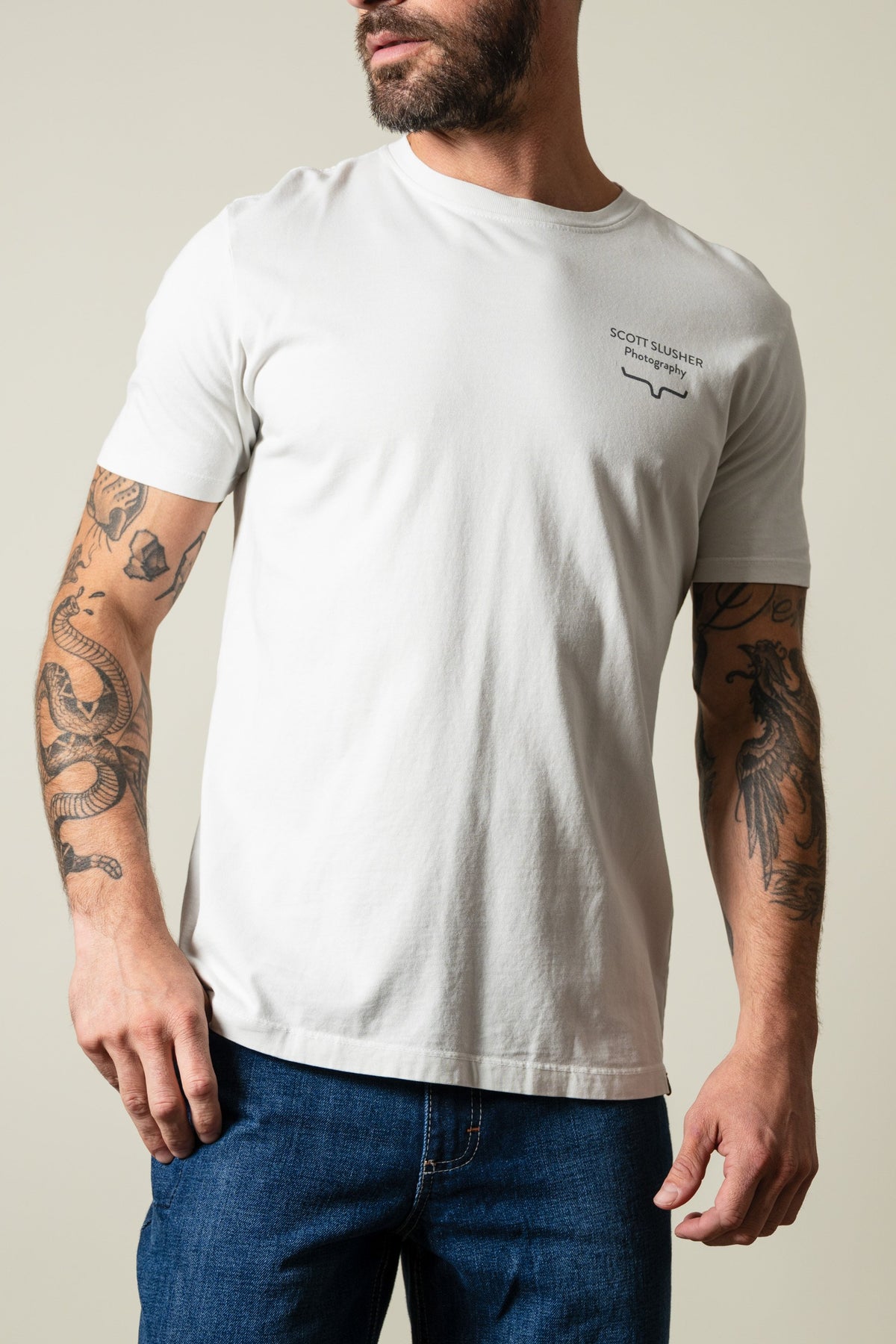 Kimes Ranch SS Bronc Ride short sleeve shirt in natural with SCOTT SLUSHER Photography chest graphic; #color_natural