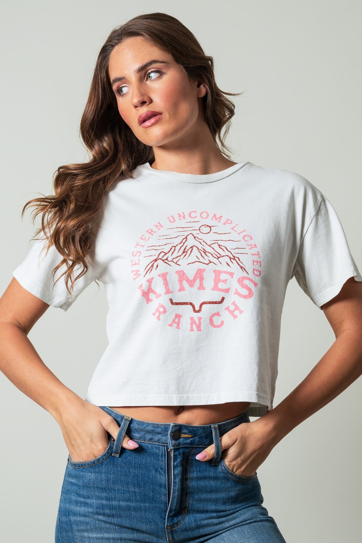 Kimes Ranch The Pass shirt in Natural with short sleeves, crewneck and a front graphic of mountains with the text Western; #color_natural