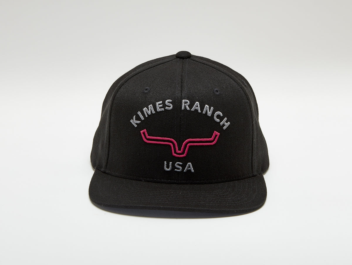 Kimes Ranch Arched Trucker Hat in black with embroidered Kimes Ranch USA logo