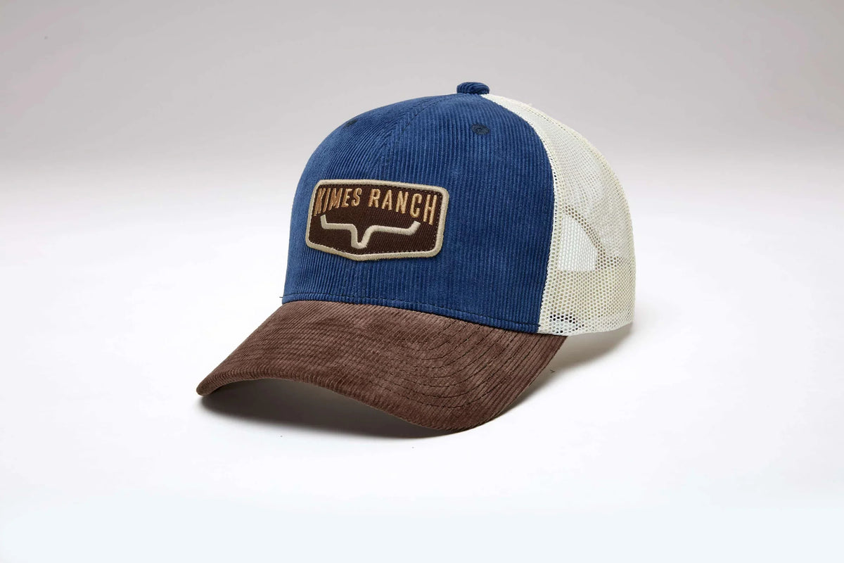 Kimes Ranch Fourteen blue corduroy trucker hat with brown brim and mesh back featuring embroidered Kimes Ranch logo patch; #color_blue