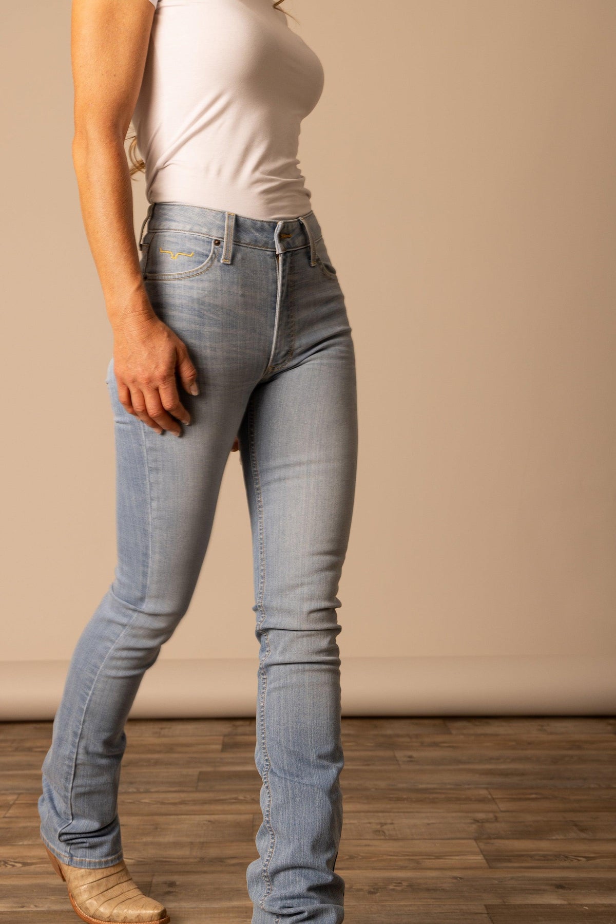 Kimes Ranch Sarah light wash jeans with a slim fit and visible Kimes Ranch logo on the back pocket; #color_light wash