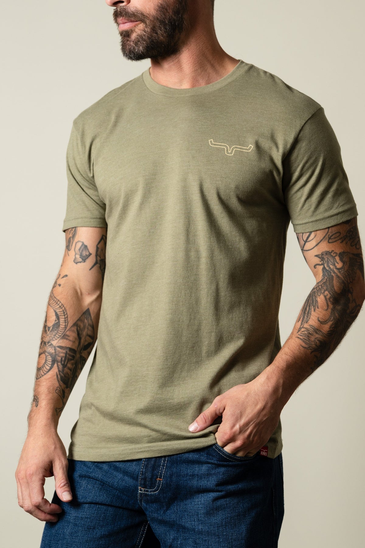Kimes Ranch Camo Back short sleeve crewneck tee in Light Olive with Kimes Ranch logo on chest; #color_light olive