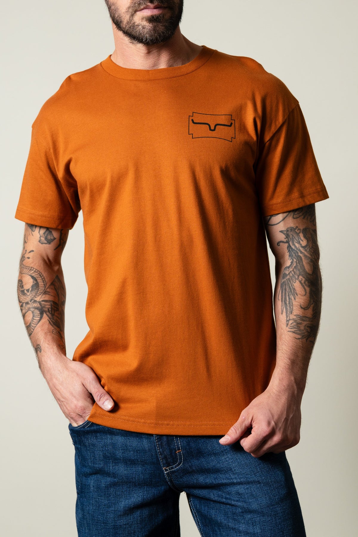 Kimes Ranch Camo Crest short sleeve t-shirt in clay, front view with chest logo; #color_clay