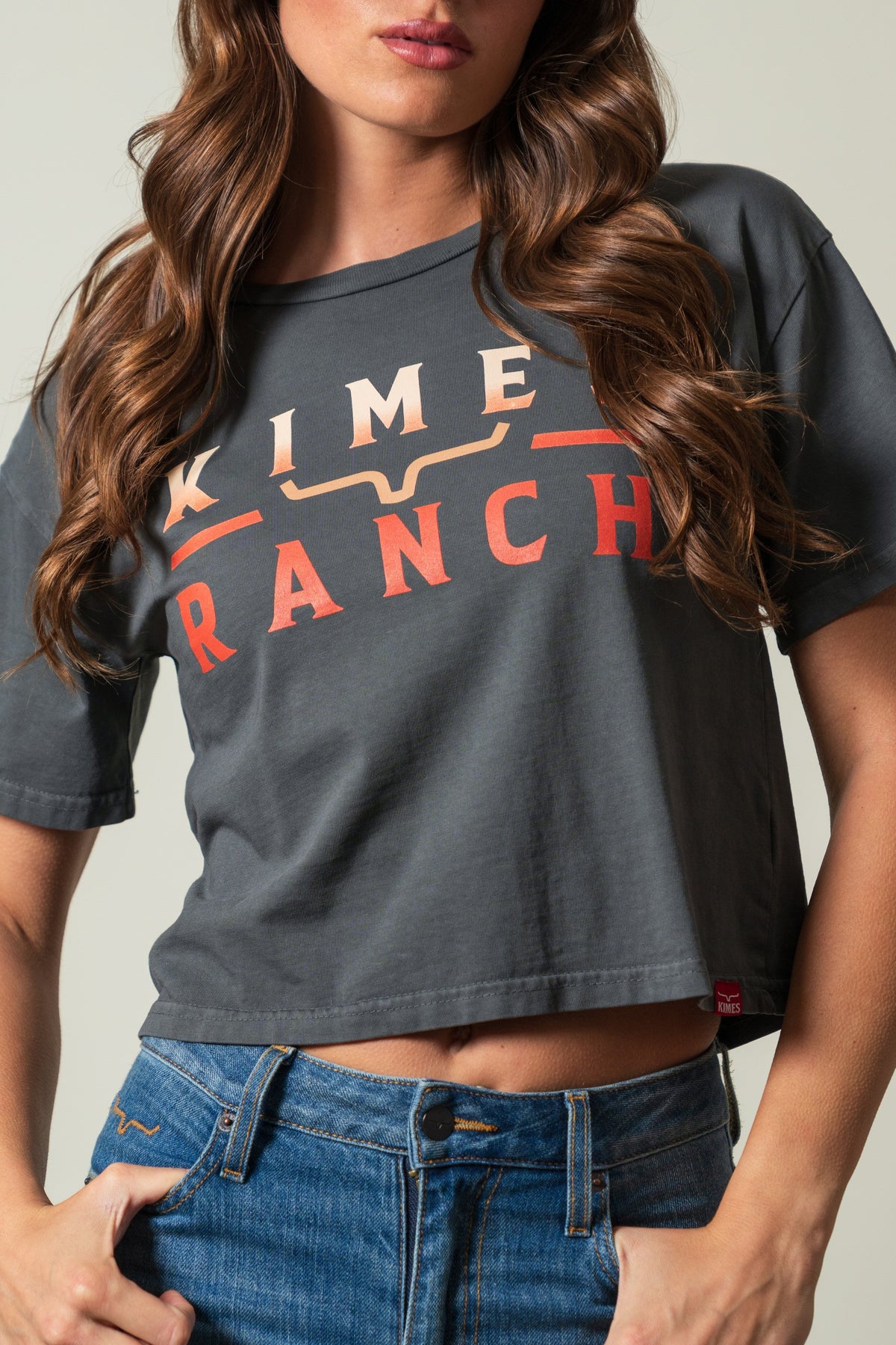 Kimes Ranch Faded Brand pepper crop tee with orange KIME RANCH front print and longhorn mark; #color_pepper