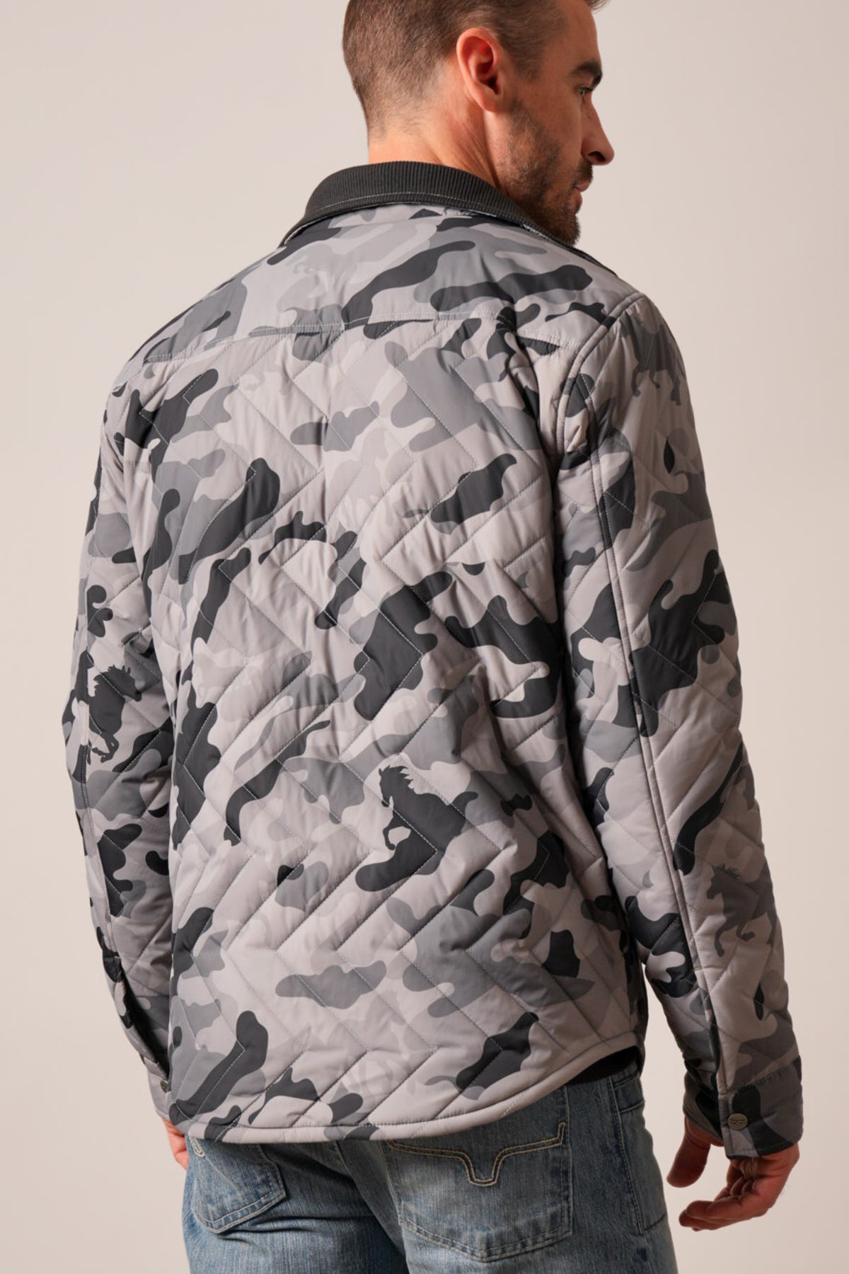 Kimes Ranch Skink jacket in charcoal camouflage with quilted back panel and long sleeves