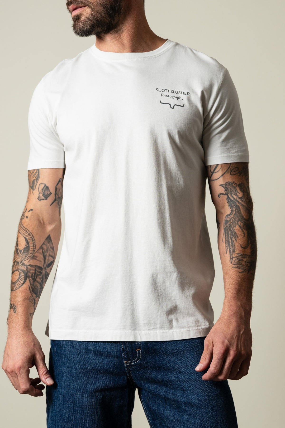 Kimes Ranch SS Bronc Ride short sleeve shirt in white featuring chest graphic SCOTT SLUSHER Photography with logo; #color_natural