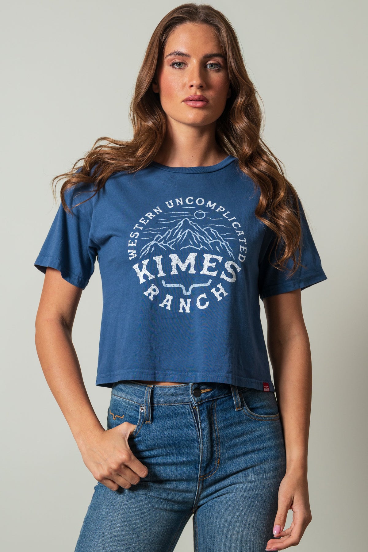 Kimes Ranch The Pass cropped dark blue tee with white mountains and Western Uncomplicated Kimes Ranch graphic; #color_dark blue