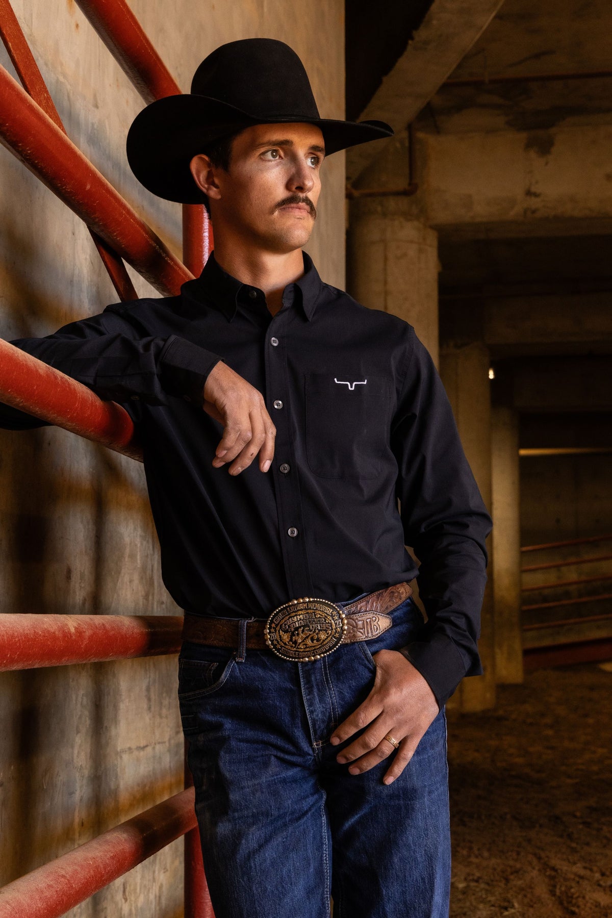 Kimes Ranch KR Team Dress Shirt in black with long sleeves, button front, and Kimes Ranch logo on the chest pocket