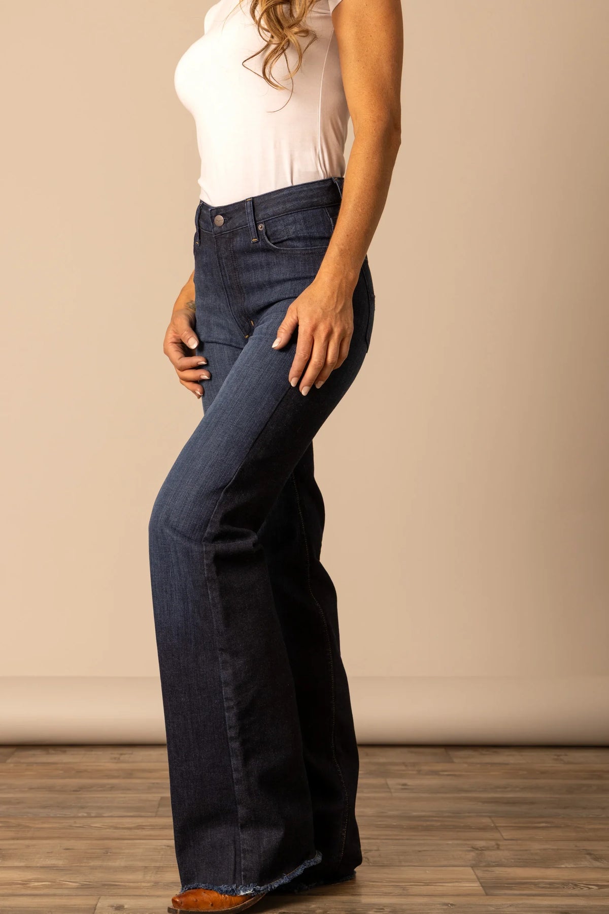 Kimes Ranch Olivia dark wash jeans with a flared leg and frayed hem; #color_dark wash