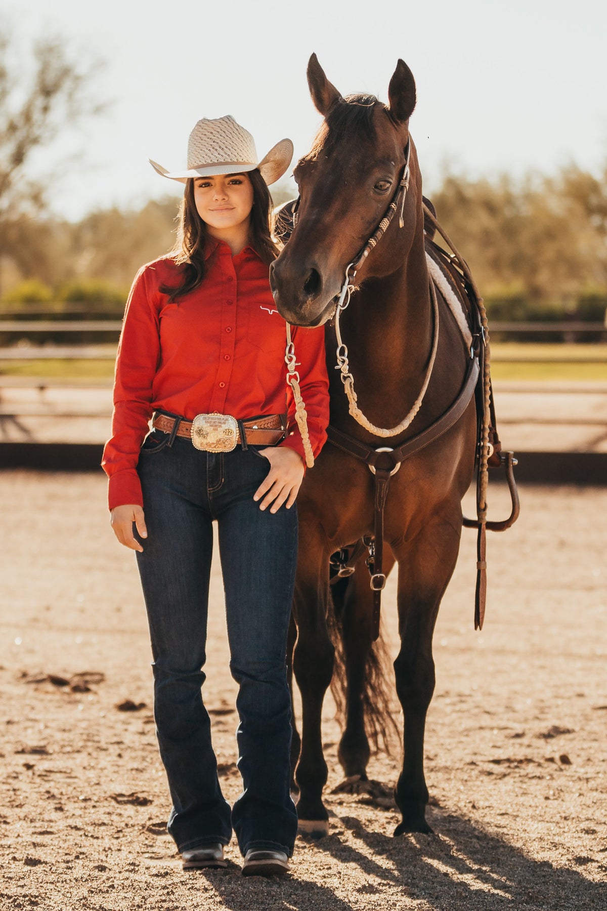 Kimes Ranch Ladies KR Team Shirt in red, long sleeve button-up with embroidered logo on the chest; #color_red